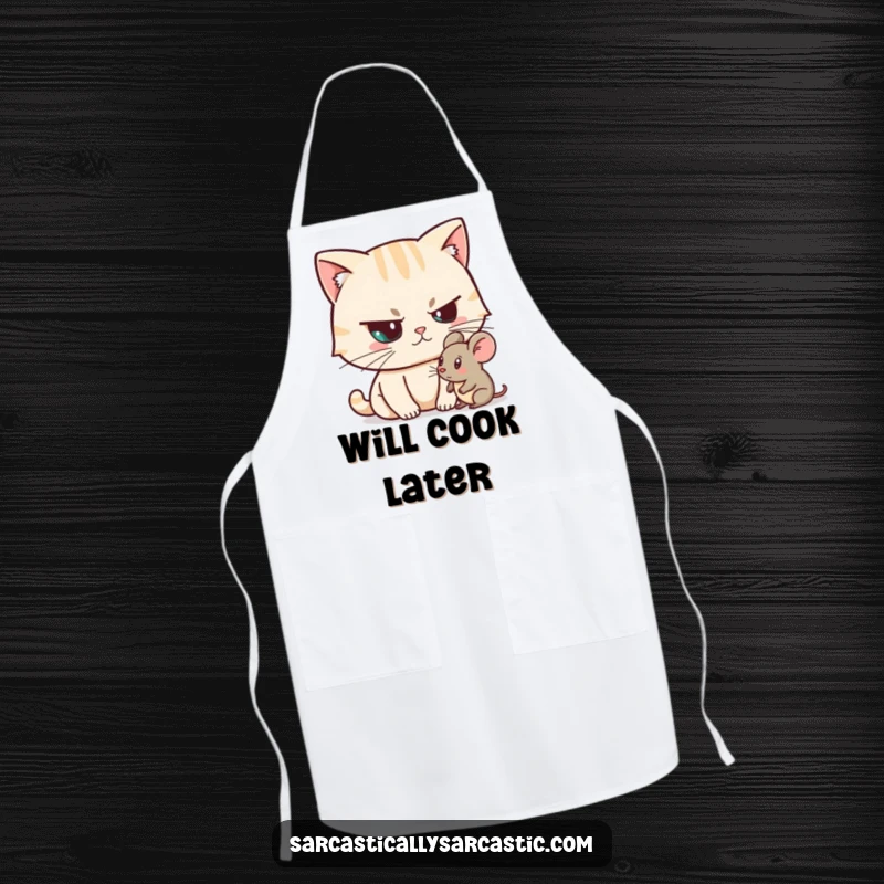 Funny Unimpressed Cat Apron showing a cat character looking unimpressed at a toy mouse, perfect for kitchen humor, a funny gift.
