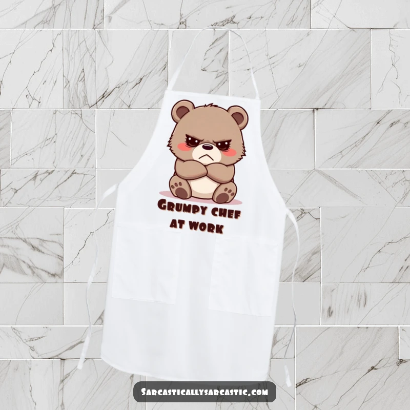 Funny Grumpy Bear Cub Apron featuring a cute cub with crossed arms, perfect for kitchen duties with a humorous, defiant spirit.