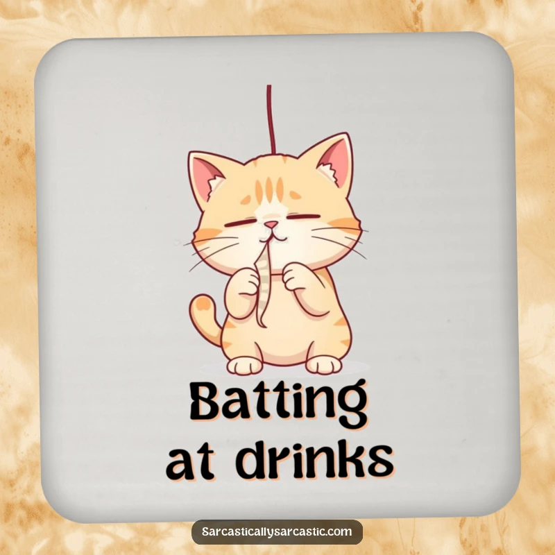 Funny cat drink coaster with a cat intensely batting a dangling string, perfect for protecting surfaces, a funny gift.