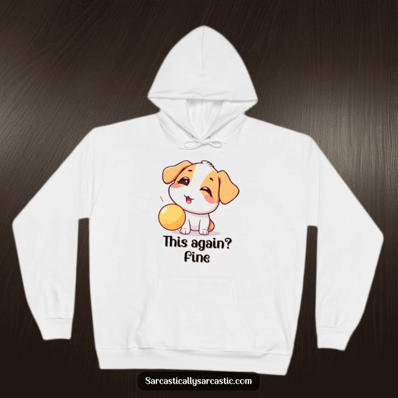 Funny dog hoodie capturing a playful eye-roll at a falling ball, offering warmth and humorous relatability for dog enthusiasts.