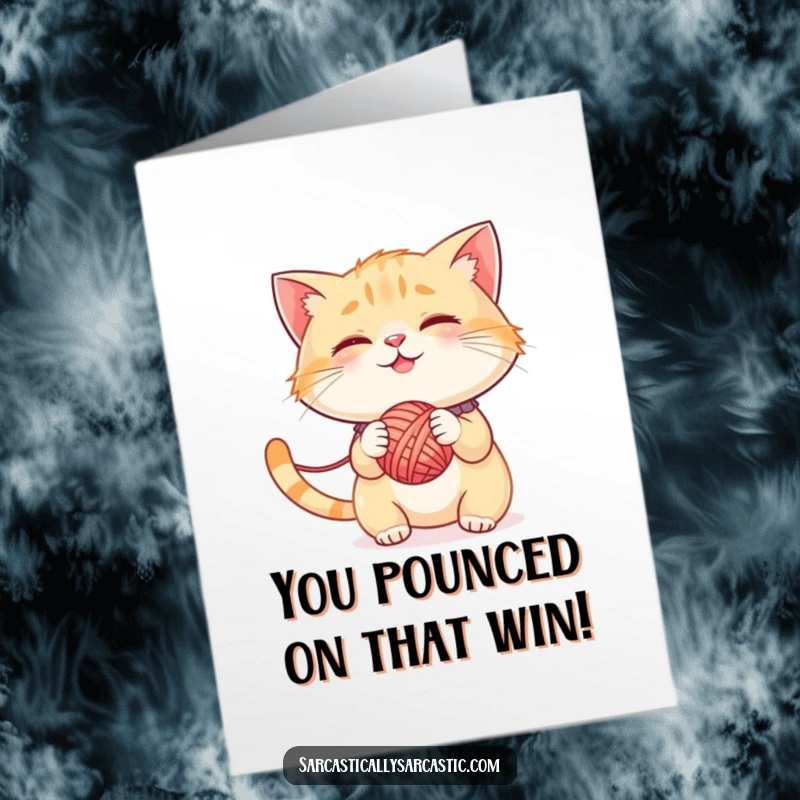 Funny Free Printable Congratulations Card: Smirking cat batting at yarn, celebrating achievements with playful chaos, downloadable fun.