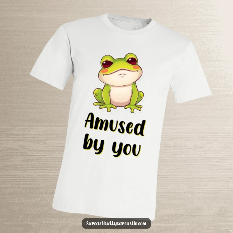 Funny Frog T-Shirt: A frog gives a dry, amused chuckle with a raised brow, conveying humorous wit.