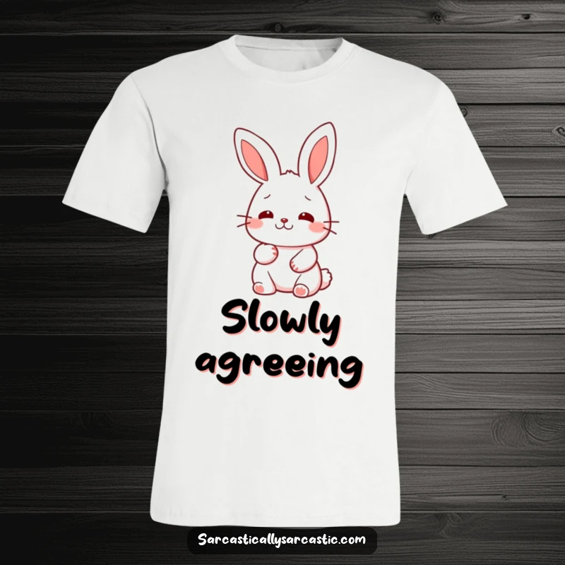 Funny kawaii rabbit t-shirt, humorously performing a slow, deliberate nod of thoughtful agreement.