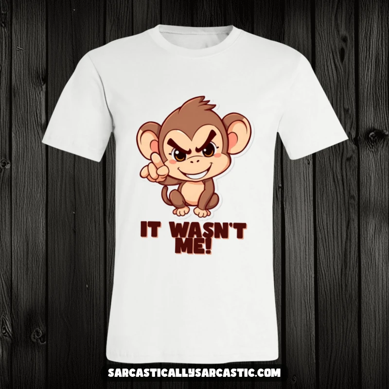 Funny T-Shirt: Mischievous monkey grinning and humorously pointing an accusing finger, a funny representation of playful blame.
