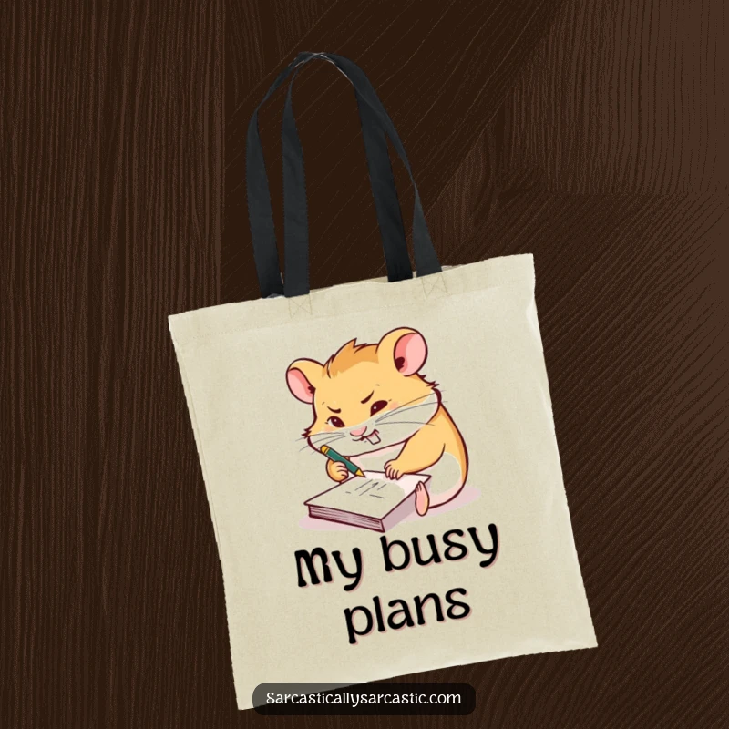 Funny tote bag featuring a hamster furiously scribbling on a tiny notepad with a smirk, ideal for carrying notes.